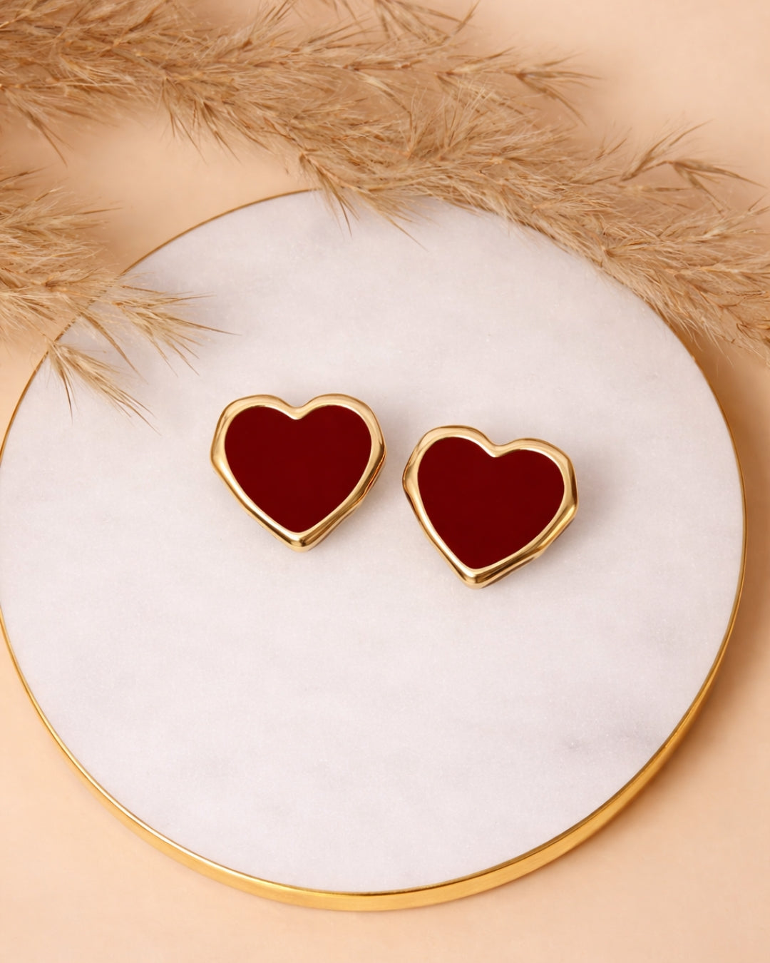 Maroon heart studs