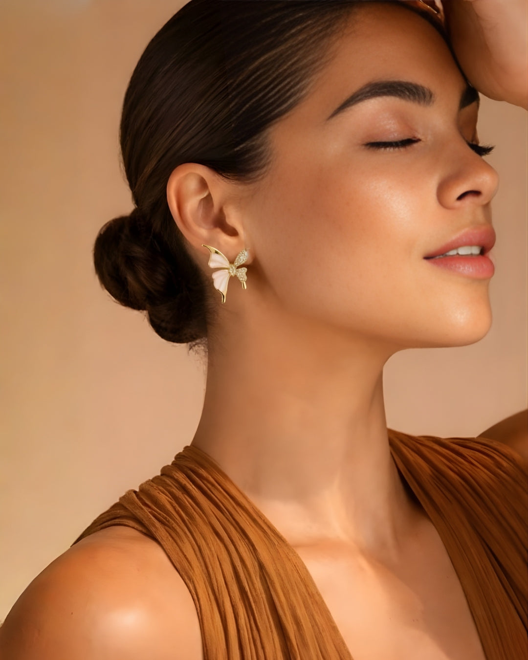 White enamel and stone butterfly stud earings