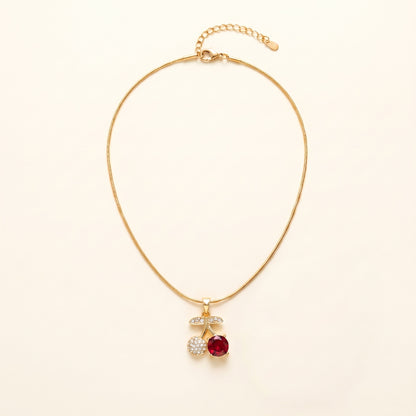 Cherry Crush Pendant Necklace flat-lay on clean cream background