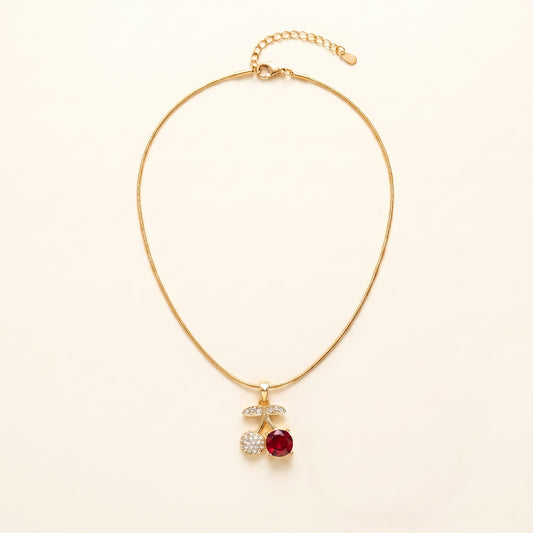 Cherry Crush Pendant Necklace flat-lay on clean cream background