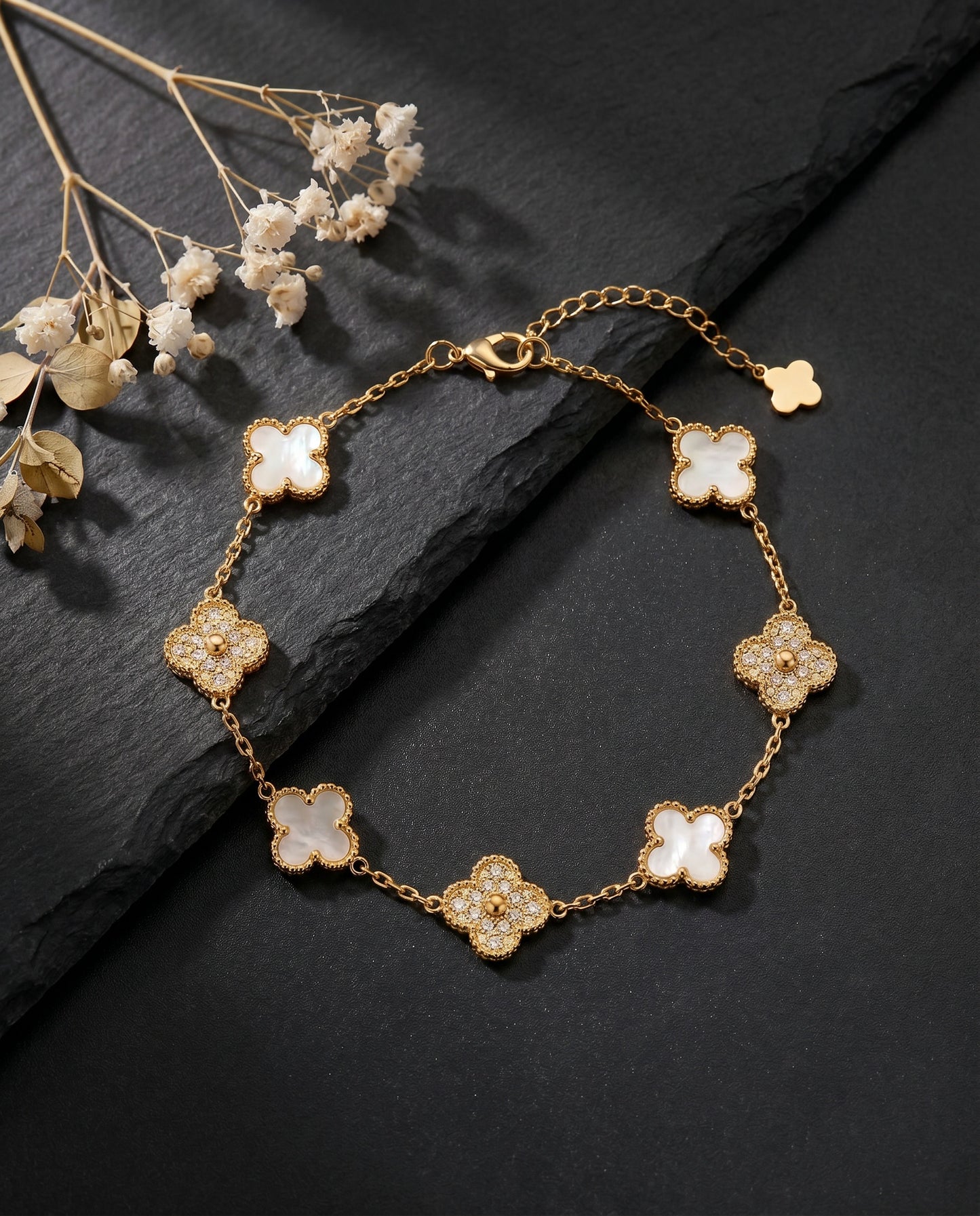 Mother-of-Pearl Clover Bracelet - styled flat lay