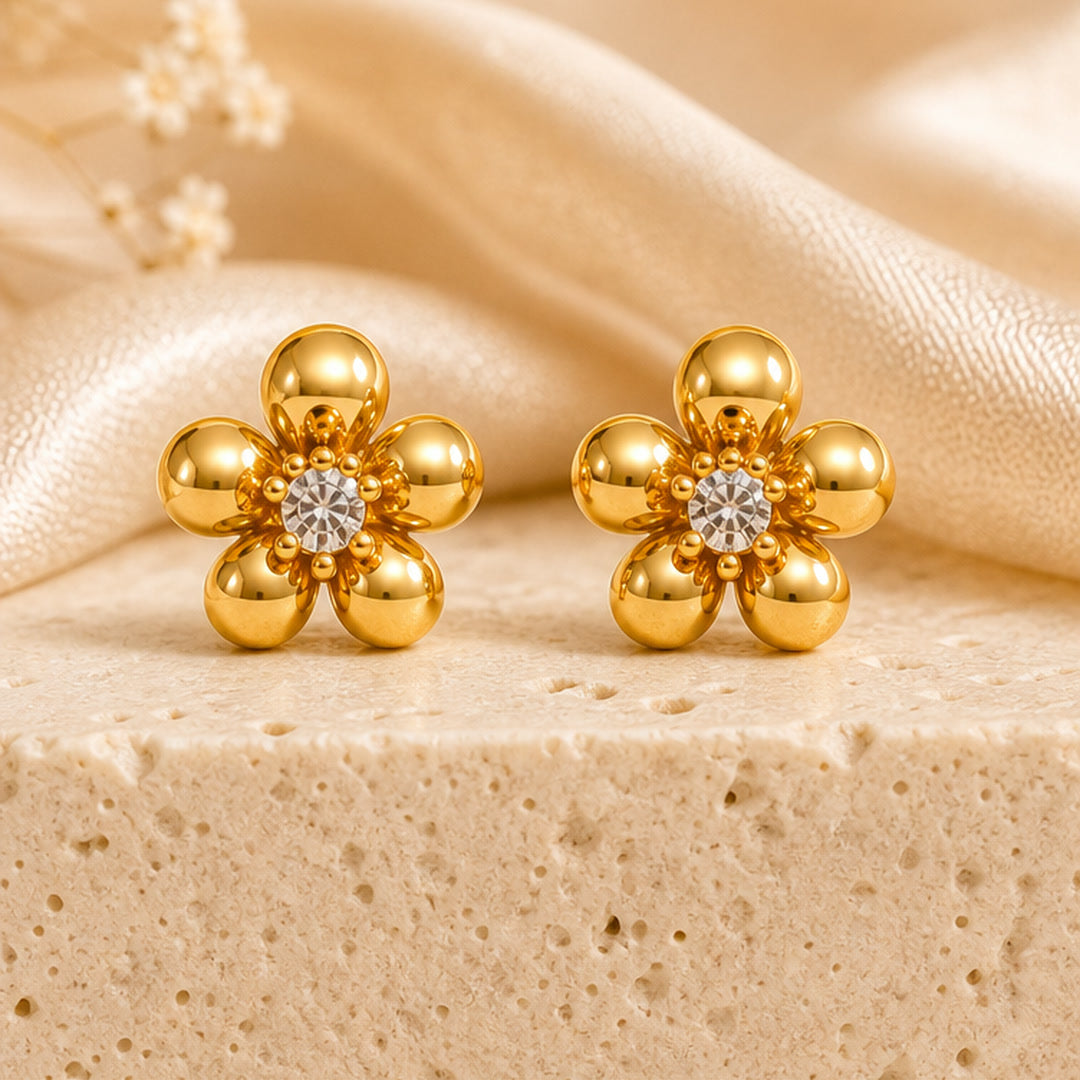 Example pair from the earrings combo: flower studs (designs vary)