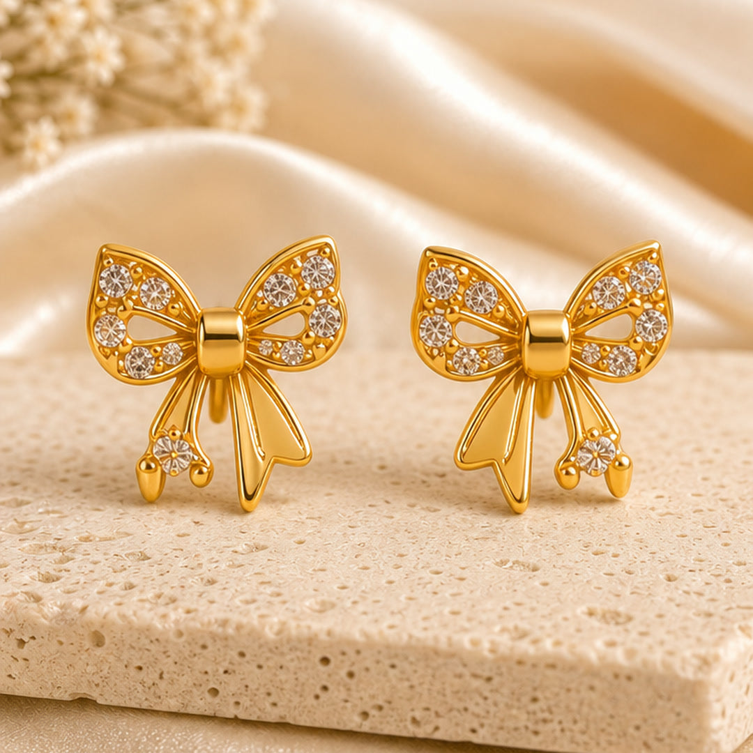 Example pair from the earrings combo: bow studs (designs vary)