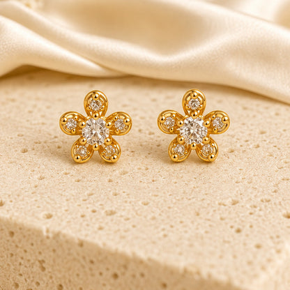 Example pair from the earrings combo: star-flower studs (designs vary)