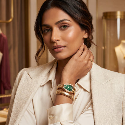 Model wearing Emerald Serpent Coil Watch Bracelet