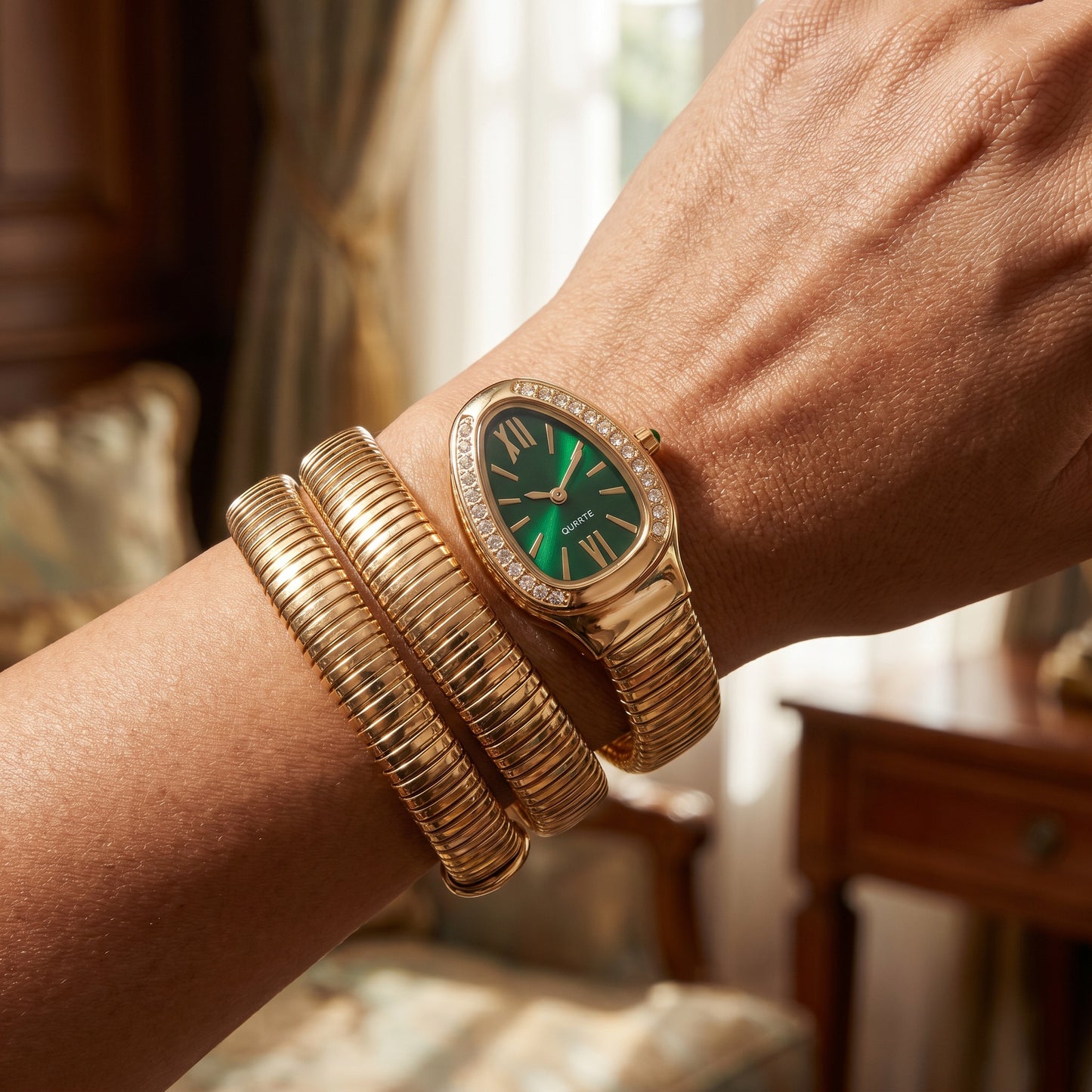 Snake watch bracelet coiled on wrist